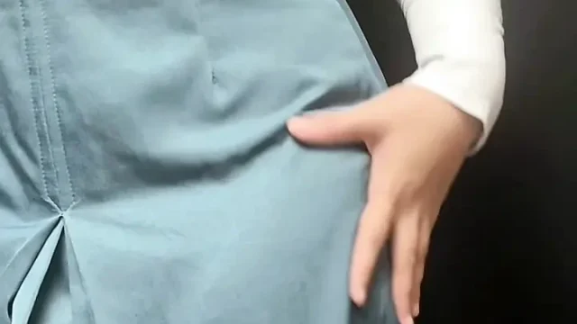 Masturbating